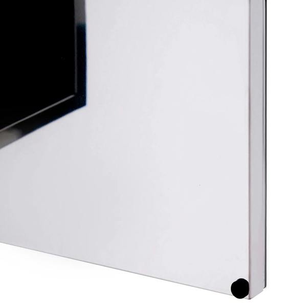 Silver cabinet corner and bottom edge of wall-mounted mirror storage unit