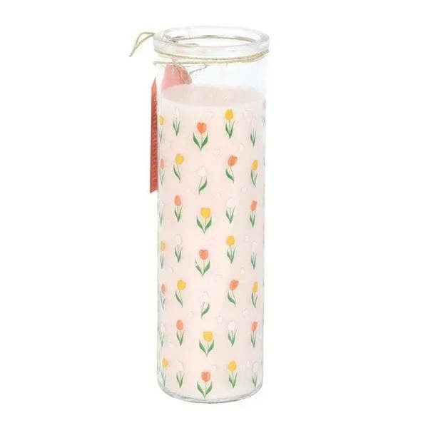 Clear glass tube candle with tulip print and dangling tag ribbon
