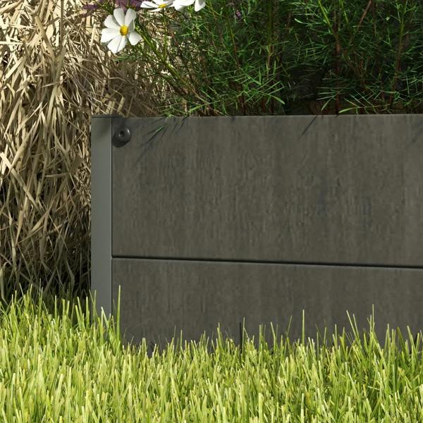 Dark grey planter box with smooth front panel and corner joints; no trellis visible.