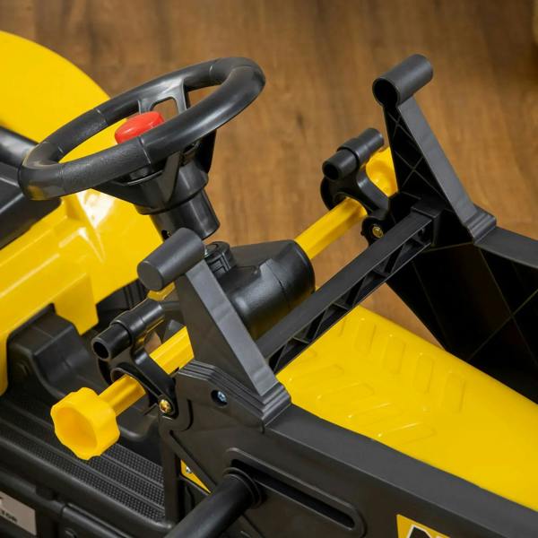 Yellow kids pedal go-kart excavator close-up of steering, frame, and loader bucket