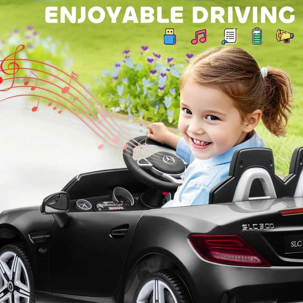 Black kids electric ride-on car interior with steering wheel and child behind wheel
