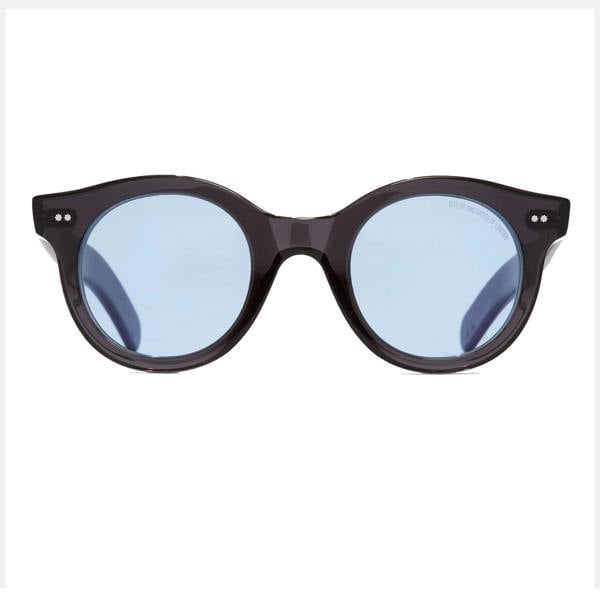 Cutler & Gross 1390 round sunglasses in black on blue