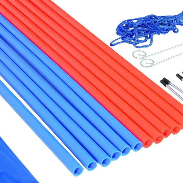 Close-up of red and blue agility poles with blue rope and metal spike parts