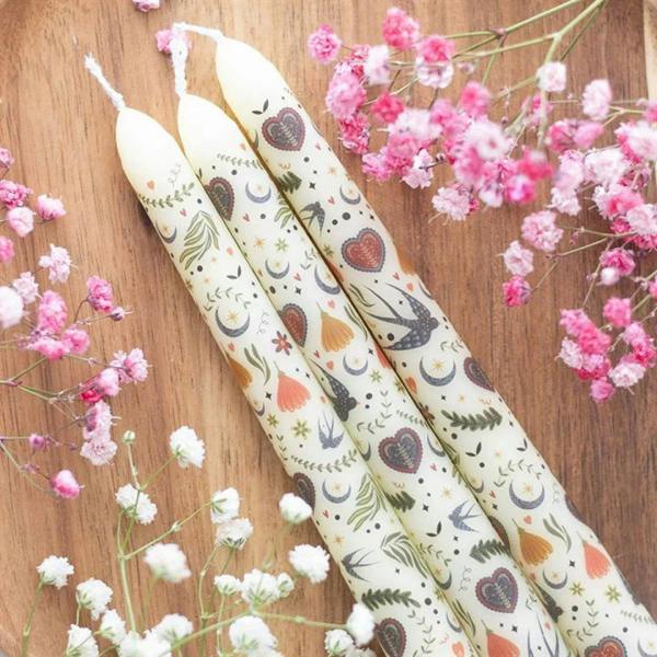 Set of three cream taper candles with owl, heart, and star night print