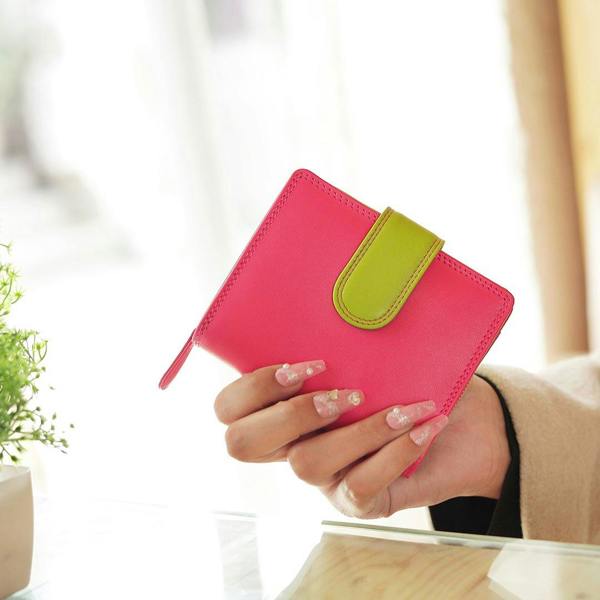 Person holding pink Soft Leather Colourful Purse Camellia London