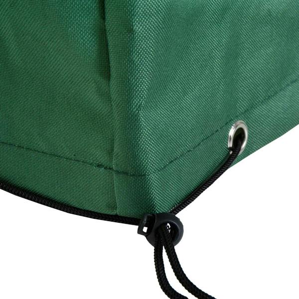 Close-up corner of green patio furniture cover with black drawcord and metal grommet for tying.