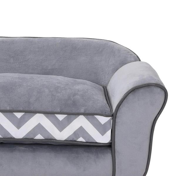 Grey pet sofa bed close-up of seat cushion edge with chevron pattern fabric