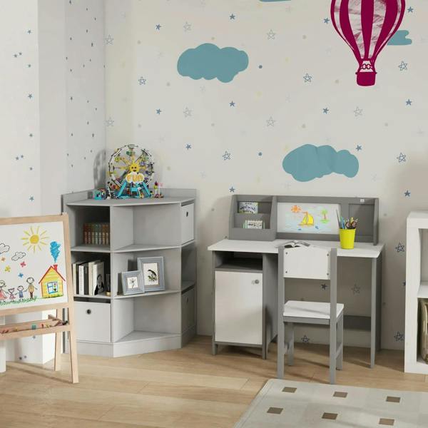 Kids book storage unit with open shelves and white drawer fronts in a playroom