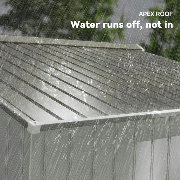 Silver metal shed roof showing rain runoff edge and drainage channels