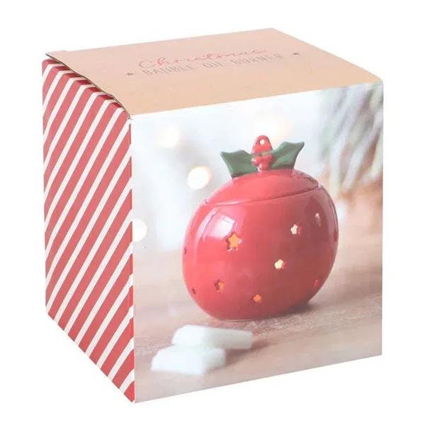 Red bauble oil burner in gift box, with green holly cap and star cutouts.