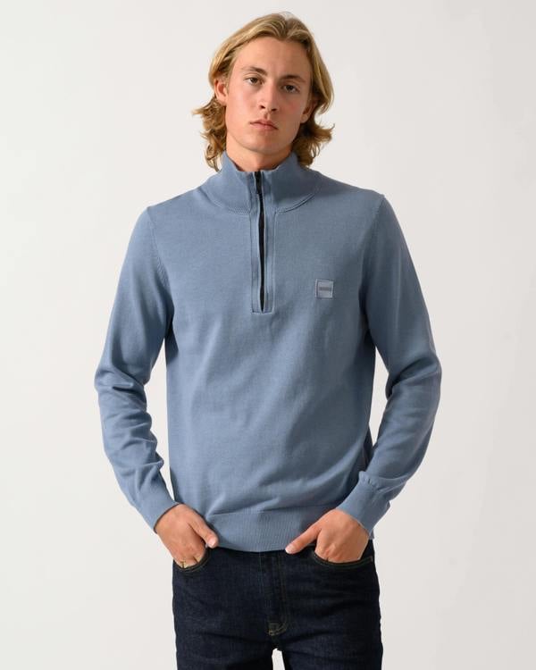 model wearing a BOSS Orange Kanobix S Mens 1/4 Zip Jumper in Medium Blue 424