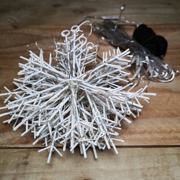 Samuel Alexander 390 LED 1.3m x 1.2m Christmas Snowflake Curtain Lights in Static Rainbow & Twinkling Orange
