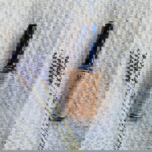 Bottle of Ralph's Orchard Pillow Mist with lavender on a textured surface