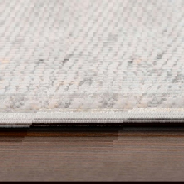 Living Room rug, beige-cream colours, dots, practicality in mind, the rug is anti-allergic.