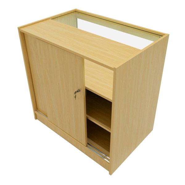 Maple Iris LED shop counter set with sliding door, glass top, and open shelving, showcasing a modern, sleek design for retail spaces