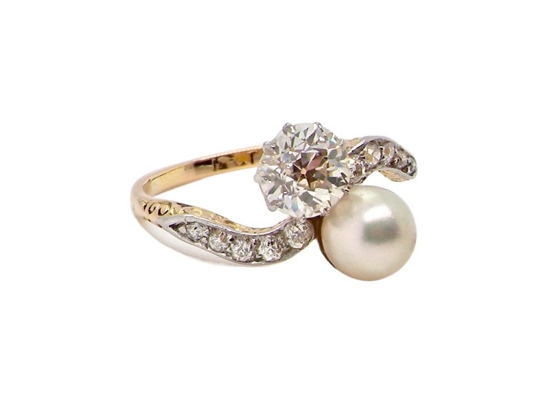 Vintage Tom A fine pearl and diamond two stone ring