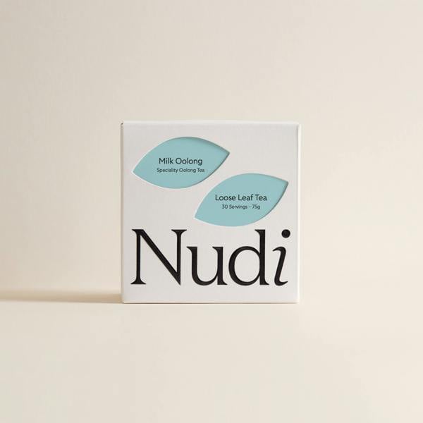 Nuditea milk oolong luxury tea box in pastel blue and teal elements.