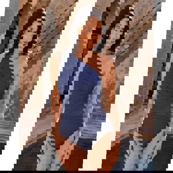 Miraclesuit Network Jena swimsuit in midnight blue with one-shoulder ruched design