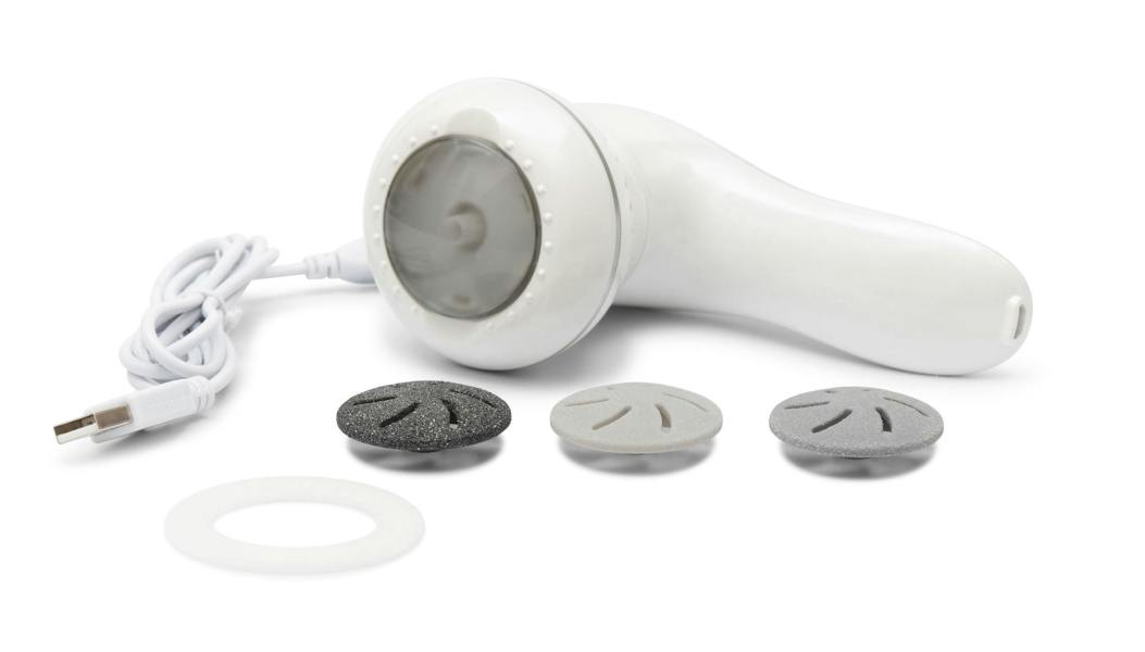 60 second spa pedi laid flat with sanding head rotating with 3 interchangeable sanding heads and USB charging cable