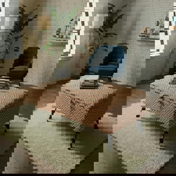 Comfortable bench seat with patterned Kingham Herringbone Fabric Terracotta upholstery