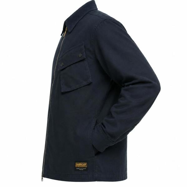 Side view of a navy Barbour International A7 overshirt with a corduroy collar, zip front, and chest pocket.
