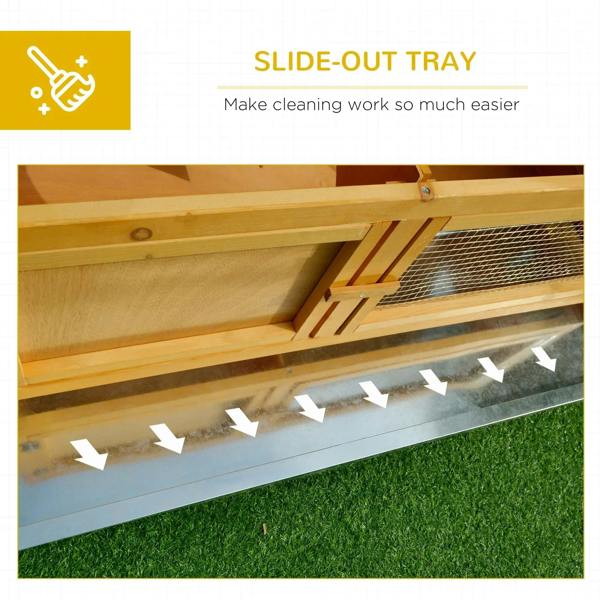Slide-out cleaning tray under hinged roof on a wooden small animal hutch