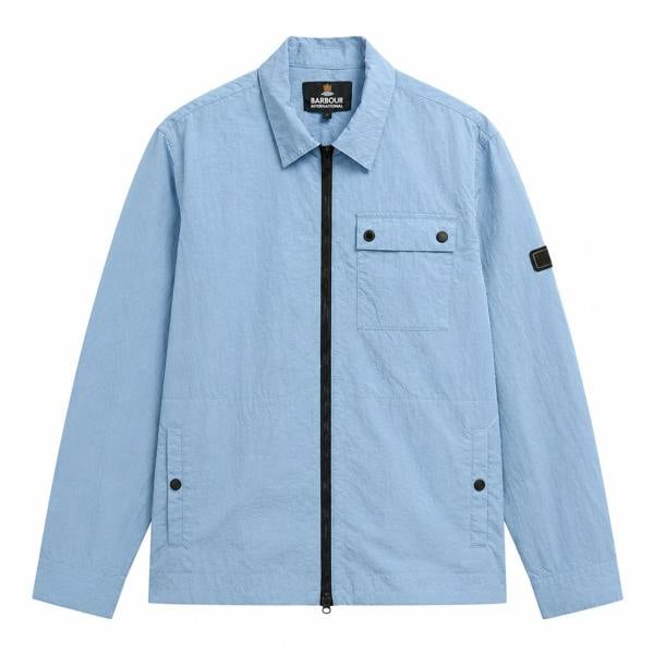 Powder blue Barbour International overshirt with a full zip front, chest pocket, and side snap-button pockets.