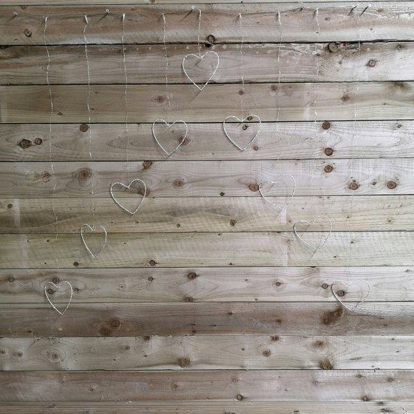 Samuel Alexander 1.2m Christmas Static Heart LED Silver Pin Wire V Curtain Lights in Rainbow