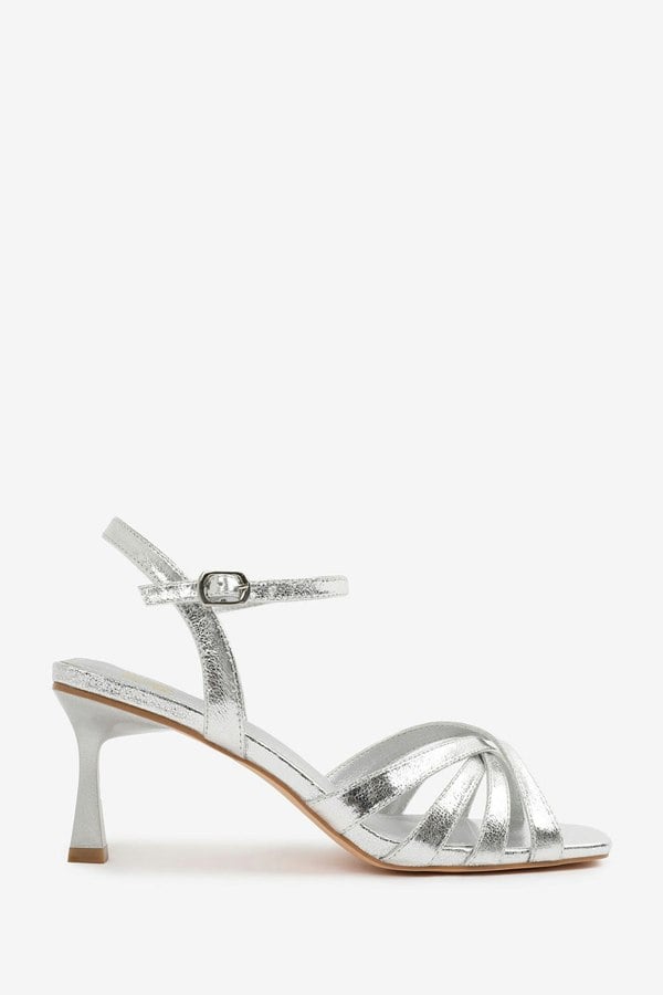 Where's That From Torigh Wide Fit Cross Over Multi Strap Adjustable Buckle Heel in Silver Crinkle Pu