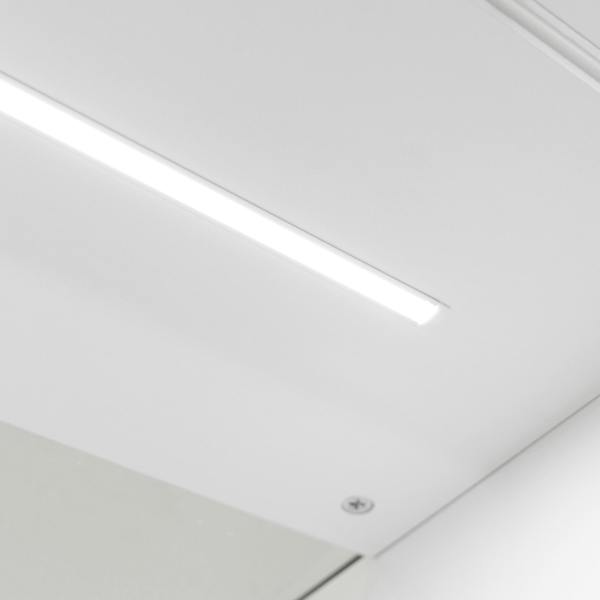 Sleek white LED light strip illuminating the top of Theia LED Shop Counter Set, enhancing modern aesthetics and visibility