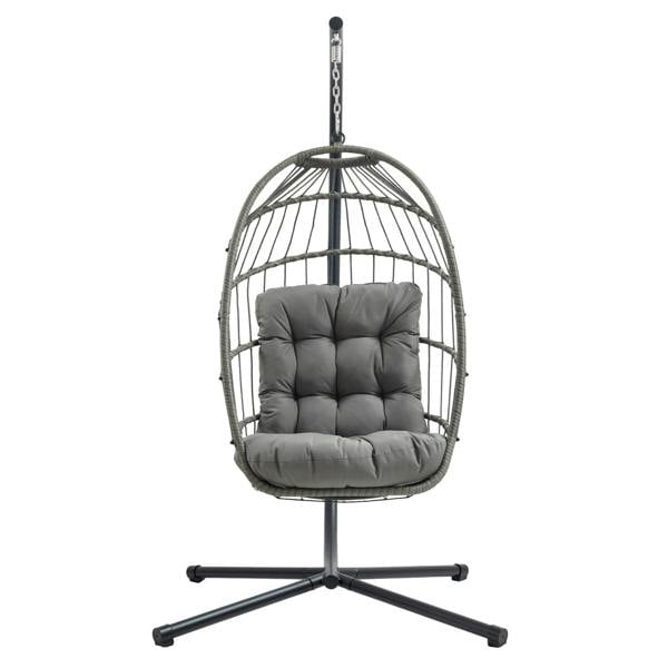 Grey rattan hanging egg chair with a plush, tufted cushion, suspended from a sturdy black metal frame, ideal for outdoor relaxation