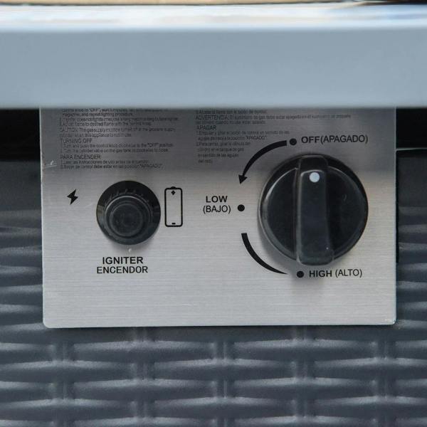 Gas firepit table control panel with igniter and flame level dial on front