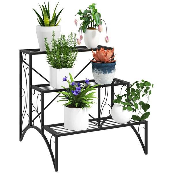 Black three-tier decorative metal plant stand with arched legs and scroll accents