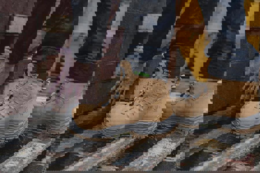 Apache Churchill Mens FIT GO Composite Toe S7S Safety Ankle Boots, rugged tan work boots with reinforced toe and waterproof feature, designed for safety and durability in construction sites.