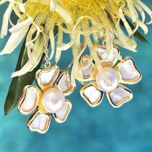 Gold floral drop earrings by LENAE London featuring freshwater pearls and mother-of-pearl.