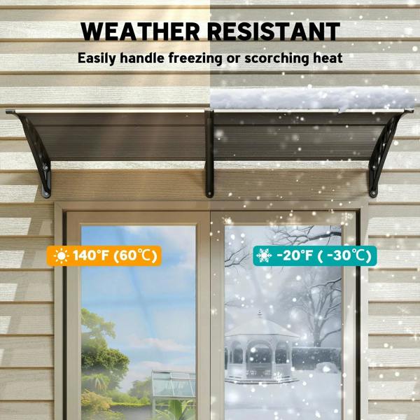 Black front door canopy awning mounted over doorway in snowy weather