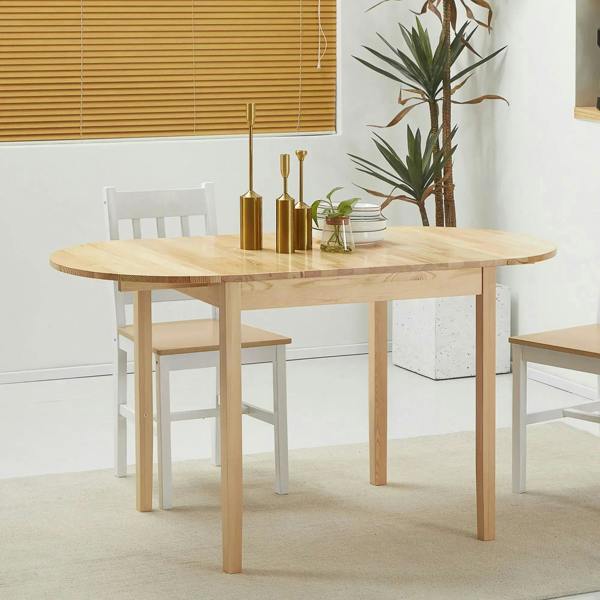 Natural wood drop-leaf dining table with two side chairs and leaf extensions in place