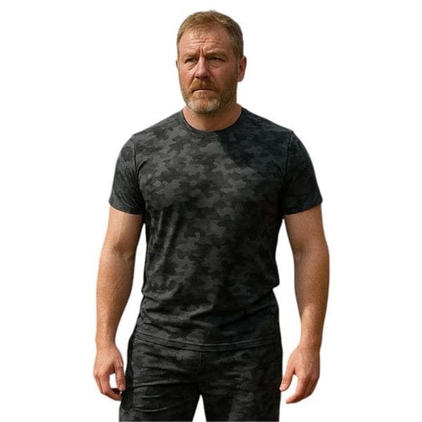 Model wearing the Game Camouflage short sleeve t-shirt in Night camo