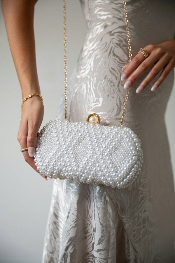 SVNX White Pearl beaded clutch bag