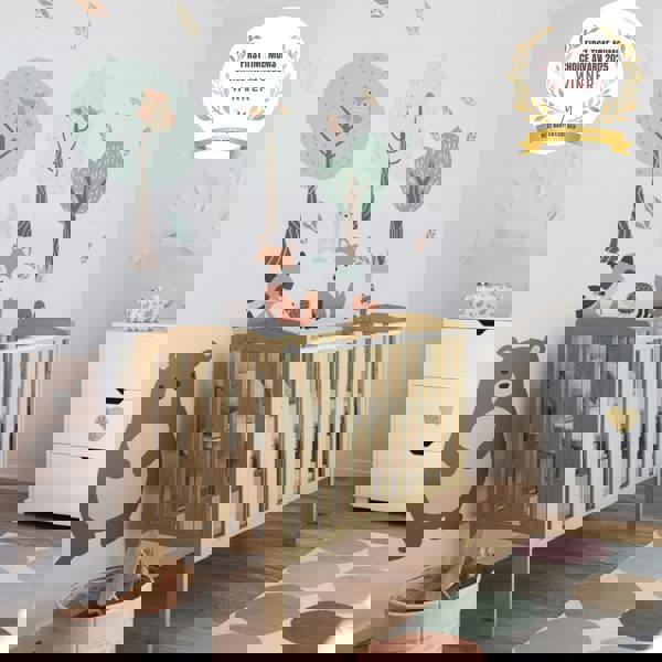 award badge - best baby cot - waffi mini space saver cot with drop side