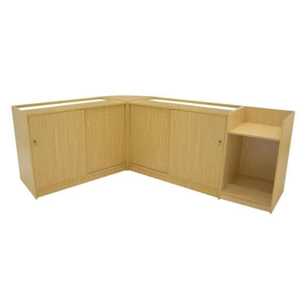 Gravity LED Shop Counter Set in maple finish, featuring a modern design with smooth surfaces, ample storage, and a corner configuration