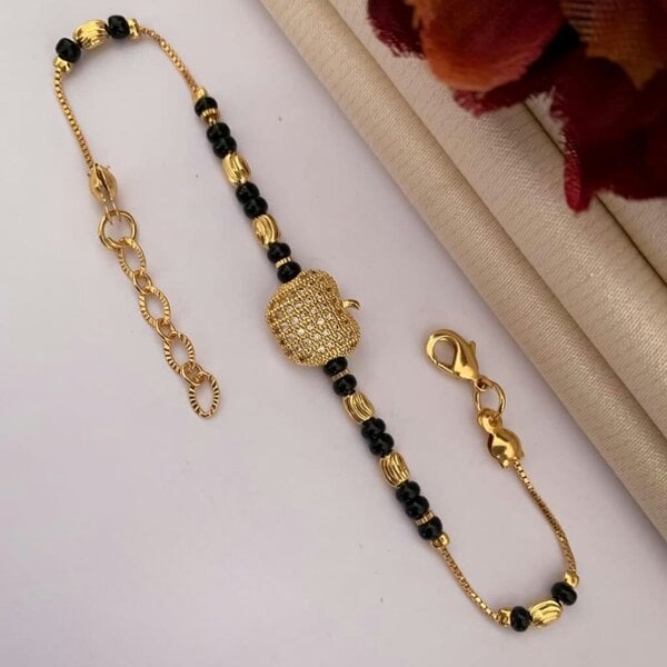 The Colourful Aura 18k Gold plated Black Bead Nazar Charm bracelet