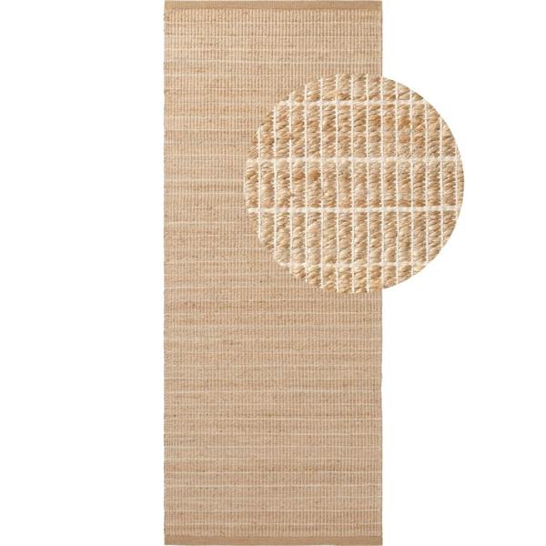 Beige woven mat with a circular textured design on a white background