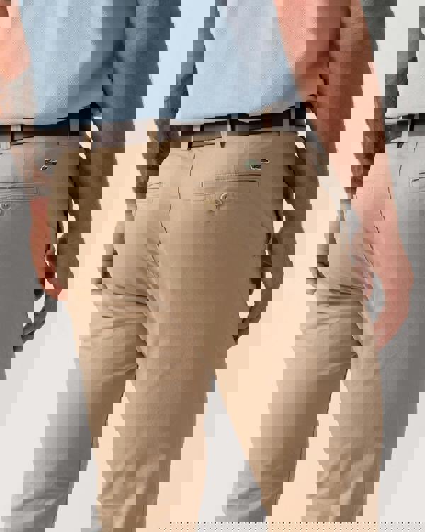 Model wearing Lacoste Slim Fit Stretch Cotton Mens Chinos in Viennese 02S - Back detail