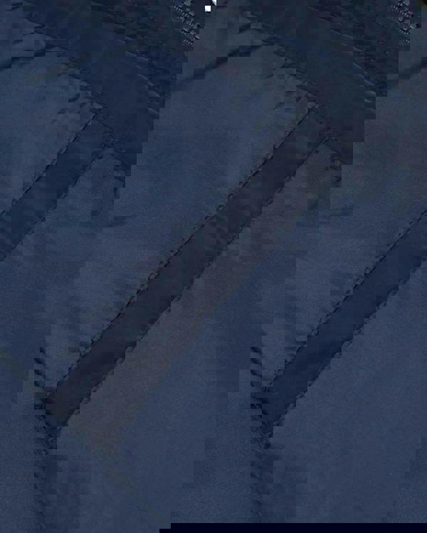 Lambretta Heaton Mens Shower-Resistant Mod Ska Hooded Lightweight Jacket Coat, close-up of the navy blue waterproof fabric and stitched pocket detail.