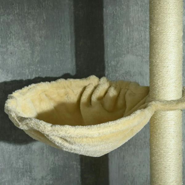 Close-up of beige plush hammock bed on a cat tree post