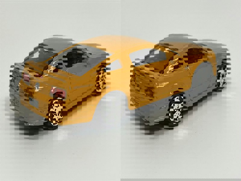 Burago 2006 Ford Mustang GT Orange 1:43 Scale - 183000