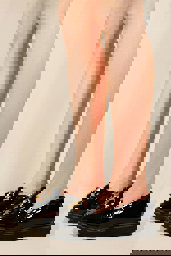 Where's That From Neda Flatfrom Loafers With Tassle and Metal Detail in Black Faux Patent
