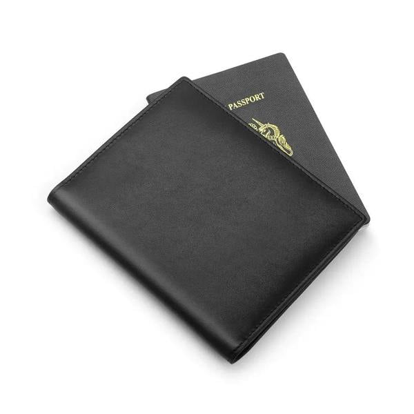 Black passport holder with gold text on a white background