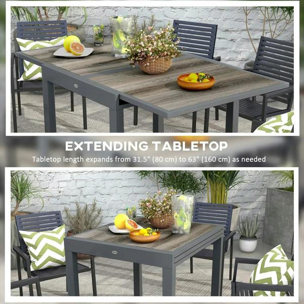 Outdoor extending dining table with grey woodgrain tabletop and dark metal frame